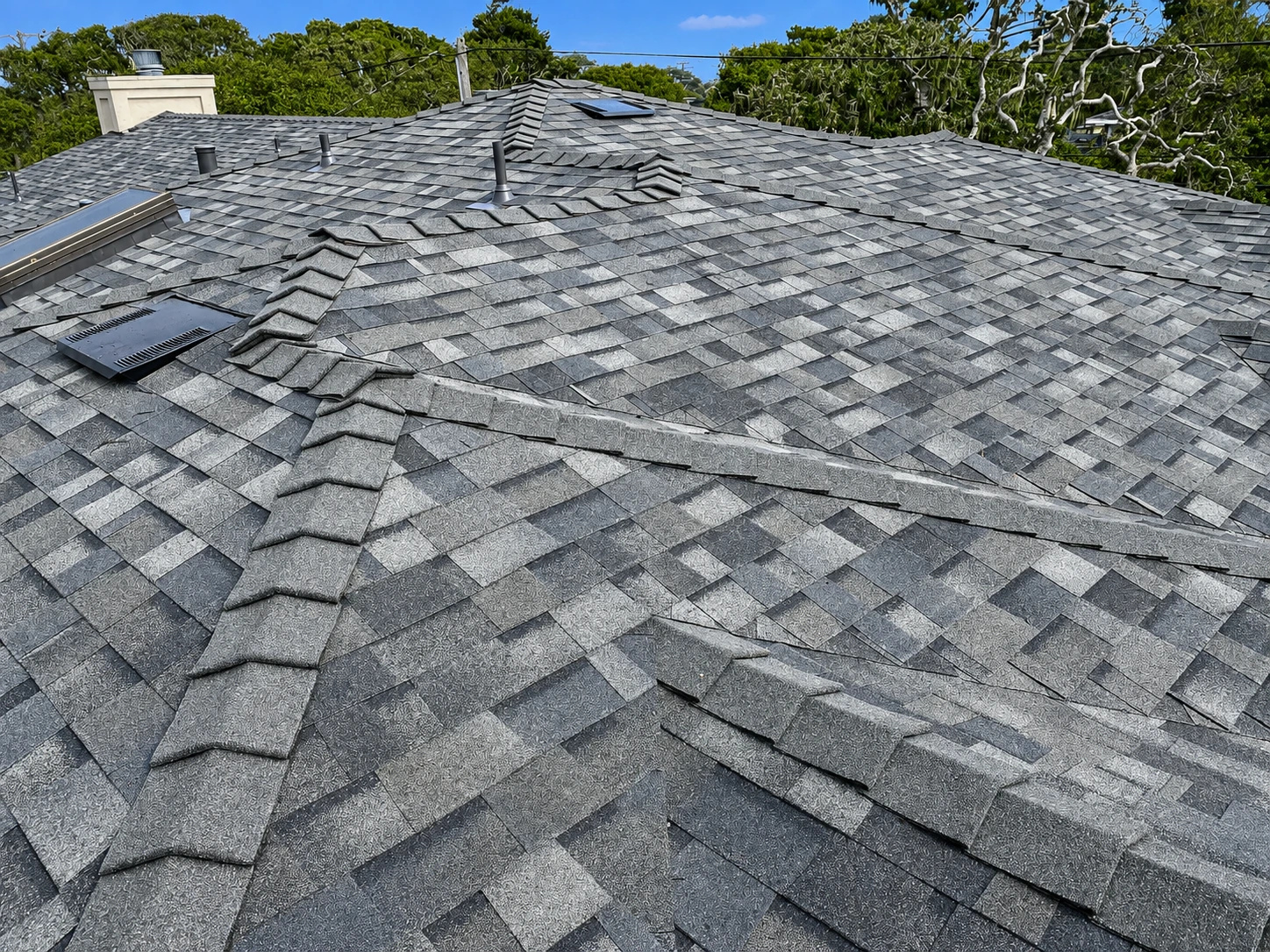 Composition shingle roofing project by Dynamite Roofing