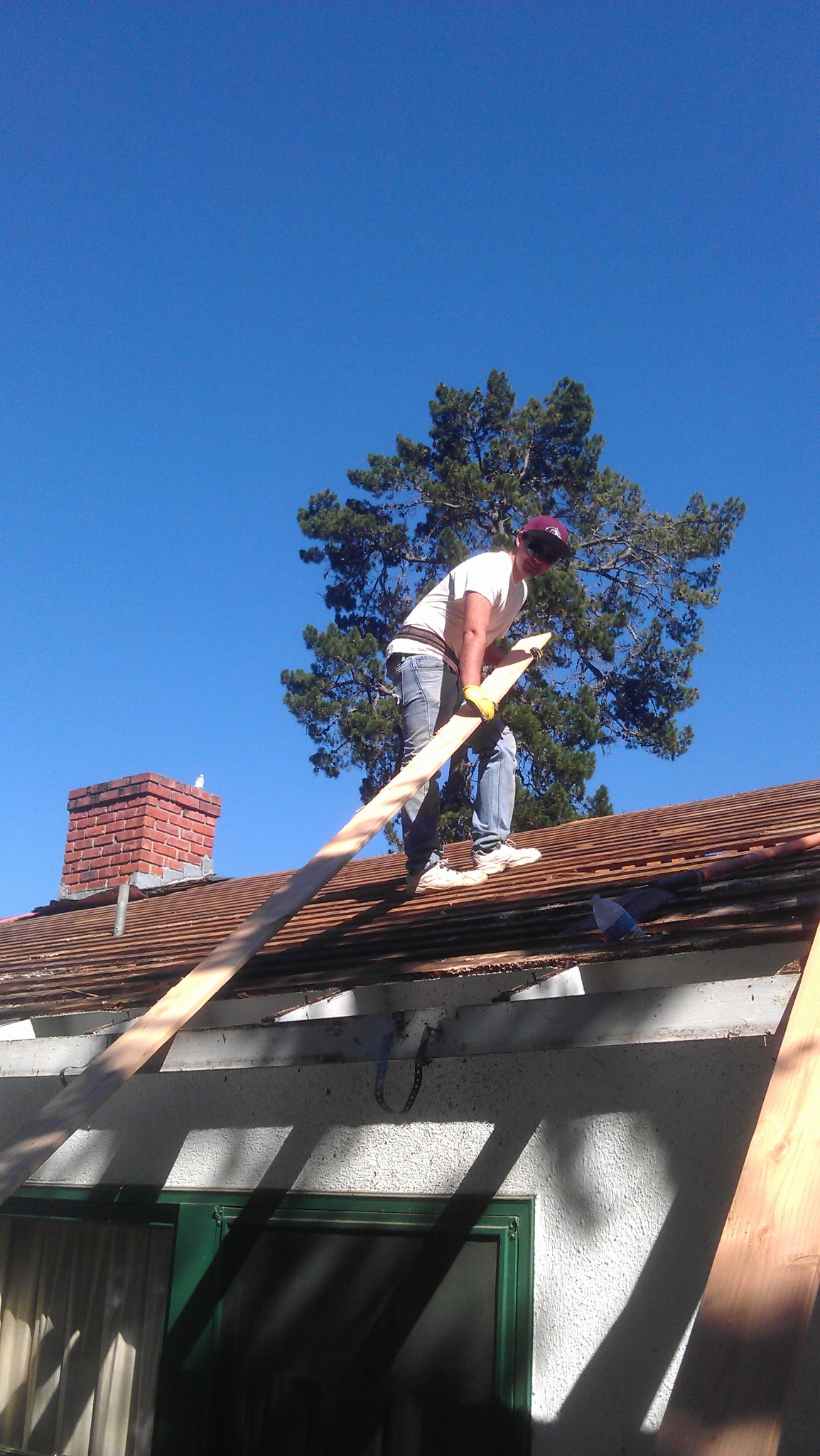 Roof repair work in progress by Dynamite Roofing